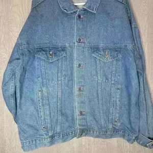 Vintage embossed dragon jean jacket. Made in the U.S.A. size large 100% cotton